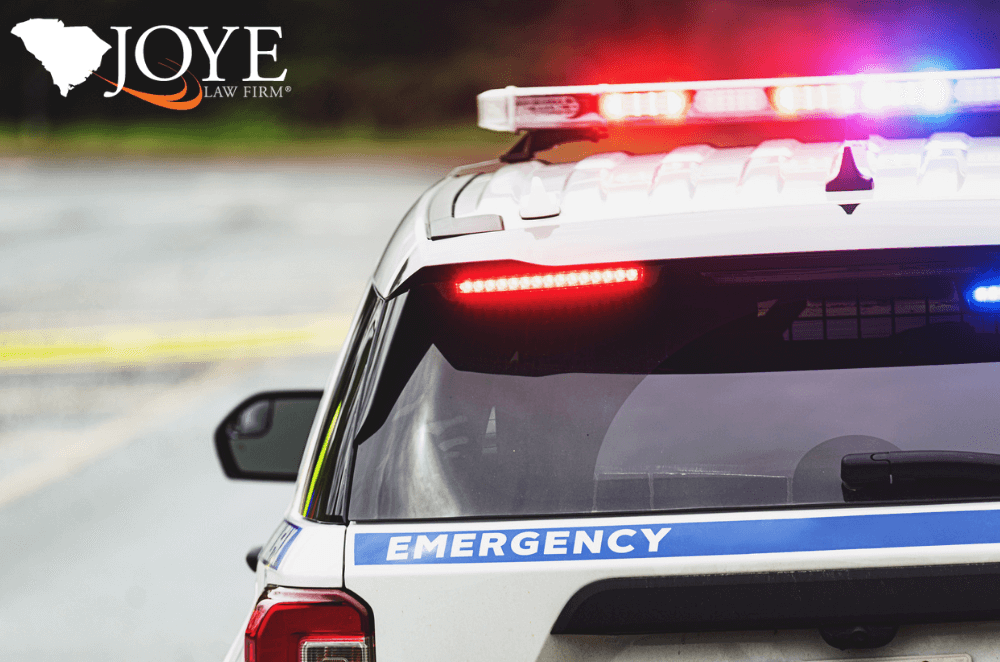 Image of a police car with its sirens and lights on